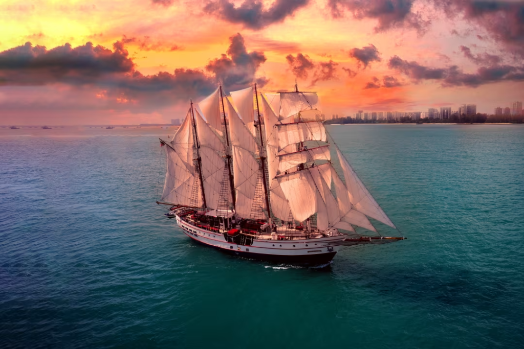 que faire à singapour suivez le guide photo d'un beau voilier sur l'eau coucher de soleil 