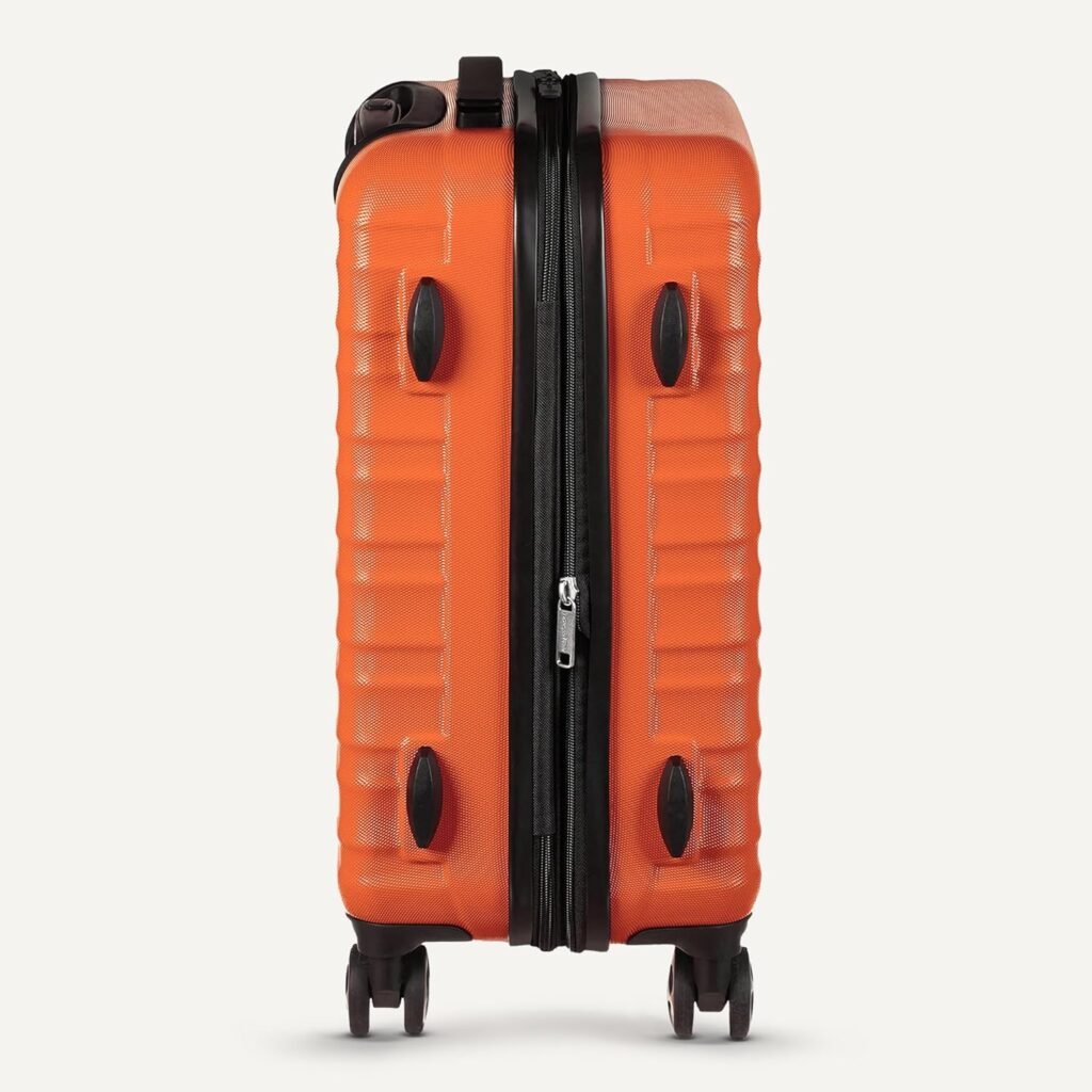 la valise orange amazon basic avec ces roues pivotante 
